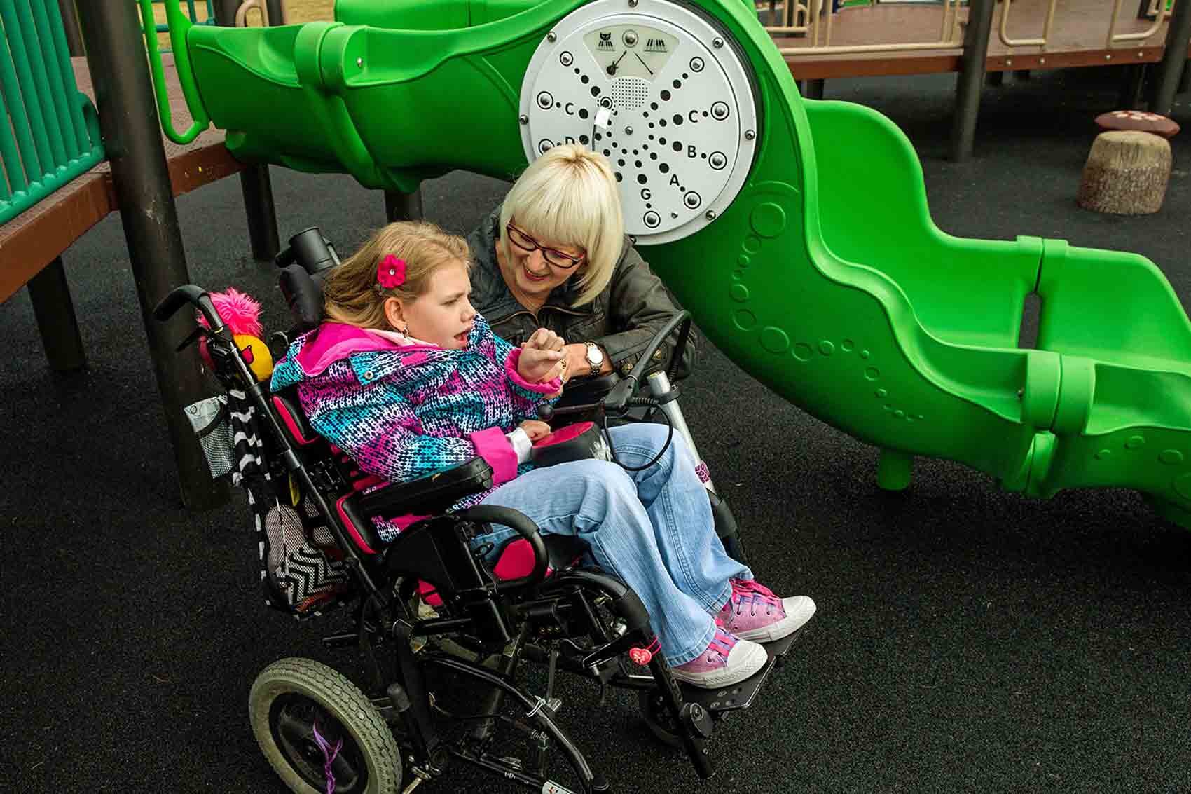 kid playing with sensory panel