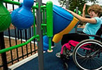 Girl in wheelchair playing