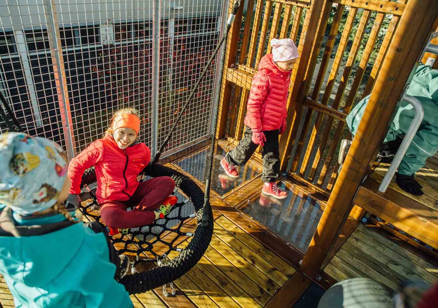 kids play inside tower playground